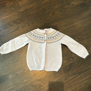 European cardigan. Two sizes available.